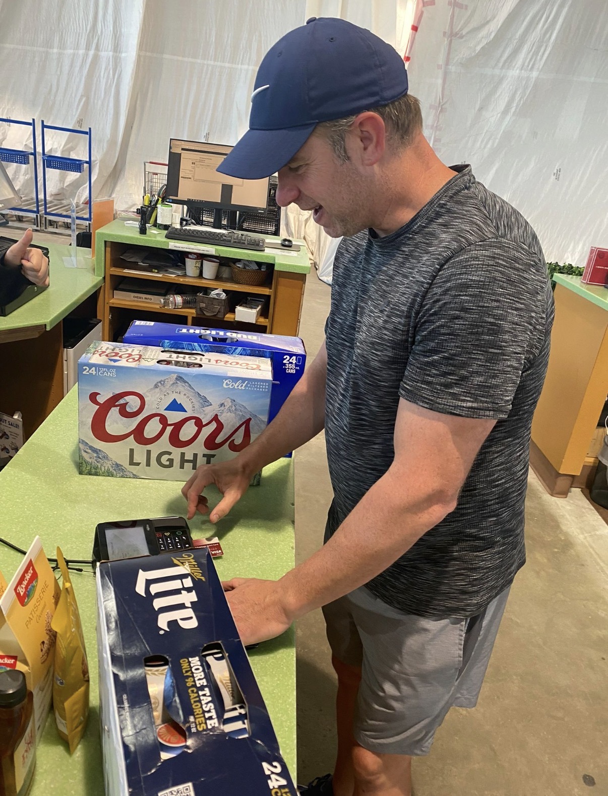 Michael Bryer picking up drinks and supplies ahead of the birthday bash
